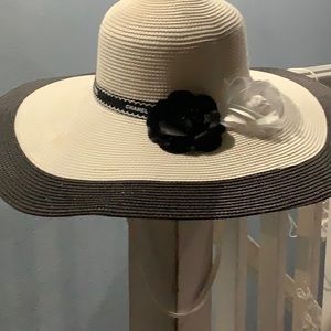 Coco Chanel beautiful straw brim hat.